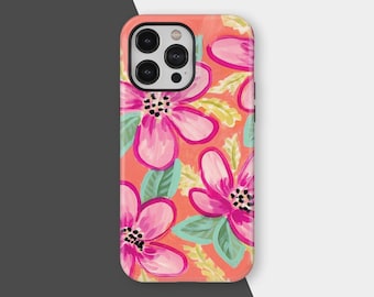 May include: A phone case featuring a vibrant floral design. The case has a coral background with large pink flowers, green leaves, and yellow accents. The phone case has a black camera module.