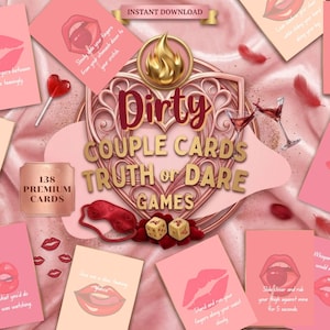 May include: A selection of pink and gold couple's truth or dare game cards. The cards feature illustrations of lips and suggestive prompts. The image includes dice, a blindfold, and the text "Dirty Couple Cards Truth or Dare Games."