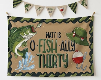 May include: A rectangular fabric banner featuring a green bass fish, a green bucket hat, and a red and white fishing bobber with a hook. The text reads MATT IS O-FISH-ALLY THIRTY. Above the banner hangs a matching triangular bunting garland.