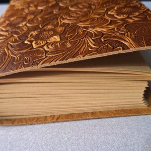 Leather Handmade Journal or Scrapbook. Thick generous size, 7 inch by 5 inch. Floral pattern.