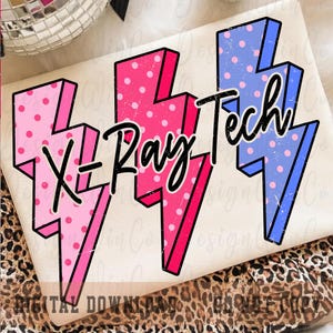 May include: A design featuring three lightning bolts in pink and blue with polka dots, and the words "X-Ray Tech" in black script. The design has a retro, distressed look, perfect for medical professionals.