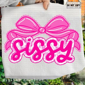 May include: A white background with a large pink bow and the word "Sissy" in a cursive font. The word "Sissy" is outlined in white and filled with a floral pattern. The text "DIGITAL DOWNLOAD" is at the bottom.