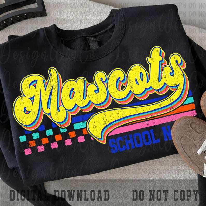 May include: Black sweatshirt with the word "Mascots" in yellow, outlined in blue and red, with a retro font. Below the word are horizontal stripes in blue, orange, and pink. The text "SCHOOL N" is below the stripes. The sweatshirt is a digital download.