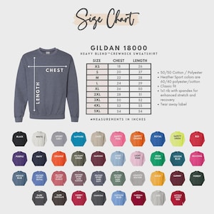 May include: A heather gray Gildan 18000 crewneck sweatshirt with a size chart and color options. The size chart shows chest and length measurements in inches. Available colors include black, white, and red.