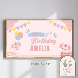 May include: Pink and blue birthday banner with the text "Happy 7th Birthday Amelia" and two cartoon axolotls. The banner has a colorful garland and balloons.