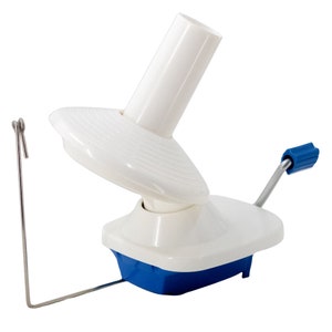 May include: White yarn swift with a blue base and a metal crank. The swift has a white plastic spindle and a metal hook for holding yarn.
