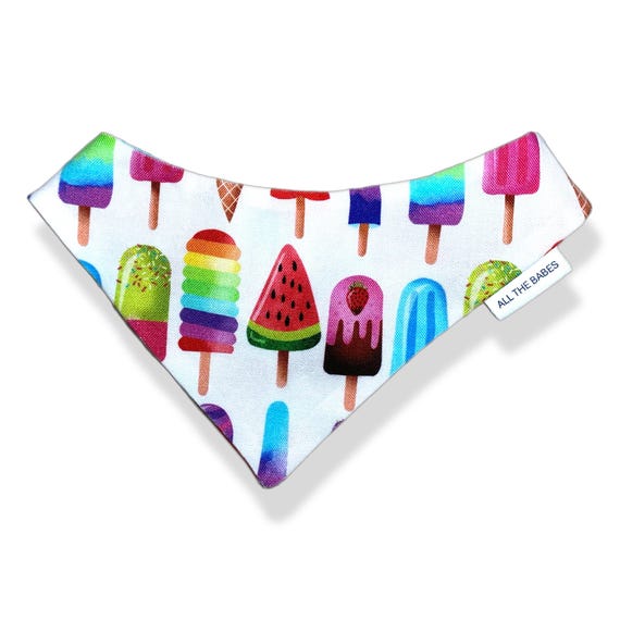 Petite Scrunchie Dog Bandana, pullover style with elastic neck. A rainbow of colored popsicles on a white background. Handmade in the USA.