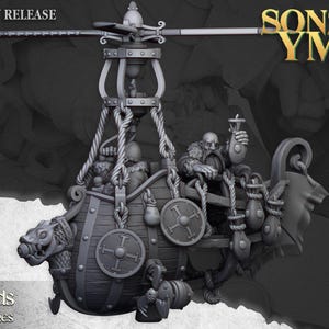 May include: A grey 3D printed miniature of a Viking-themed flying ship with a crew of three figures. The ship is suspended by ropes from a central structure with a propeller on top. The ship has a dragon head at the front and a banner at the back. The text "Sons of Ymir" is visible in the background.