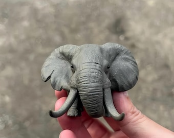Miniatura de elefante africano feita à mão em argila Zisha.