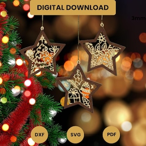 May include: Three wooden star ornaments with intricate cut-out designs, hanging against a blurred background. The stars feature festive patterns and are suspended by strings. The image includes the text "DIGITAL DOWNLOAD", "DXF", "SVG", and "PDF".