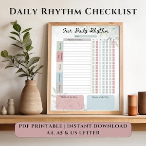 May include: A framed daily rhythm checklist with the text "Daily Rhythm Checklist" and "Our Daily Rhythm". The checklist includes sections for rhythm activities, a weekly tracker, and space for a daily habit and quote. The text "PDF Printable | Instant Download A4, A5 & US Letter" is also visible.