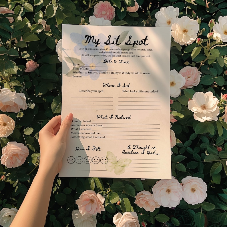 May include: A white paper titled "My Sit Spot" is held in front of a backdrop of roses. The paper has prompts for recording observations in nature, including date, time, weather, and sensory details. The paper is surrounded by pink and white roses.