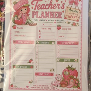 May include: A Teacher's Planner page featuring a strawberry-themed design with a character, a cat, and a strawberry house. Text includes Teacher's Planner, Teaching is a work of HEART, and sections for contact info, schedule, to-do list, and notes.