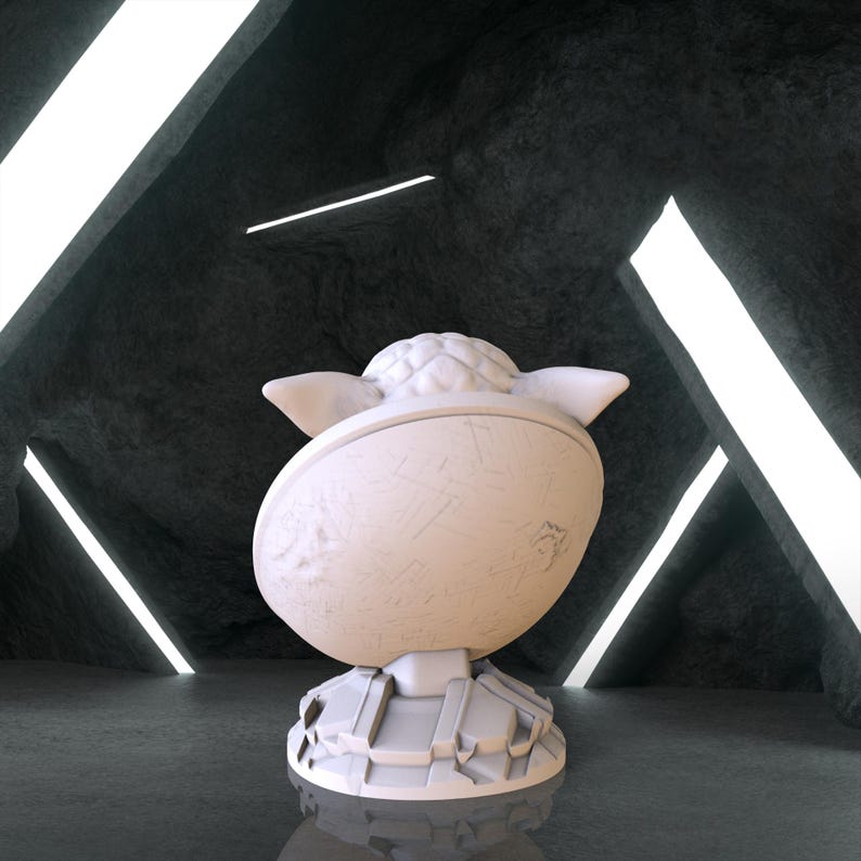 May include: White ceramic figurine of a character from Star Wars, Yoda, with a textured surface. The figurine is standing on a round base with a textured surface.