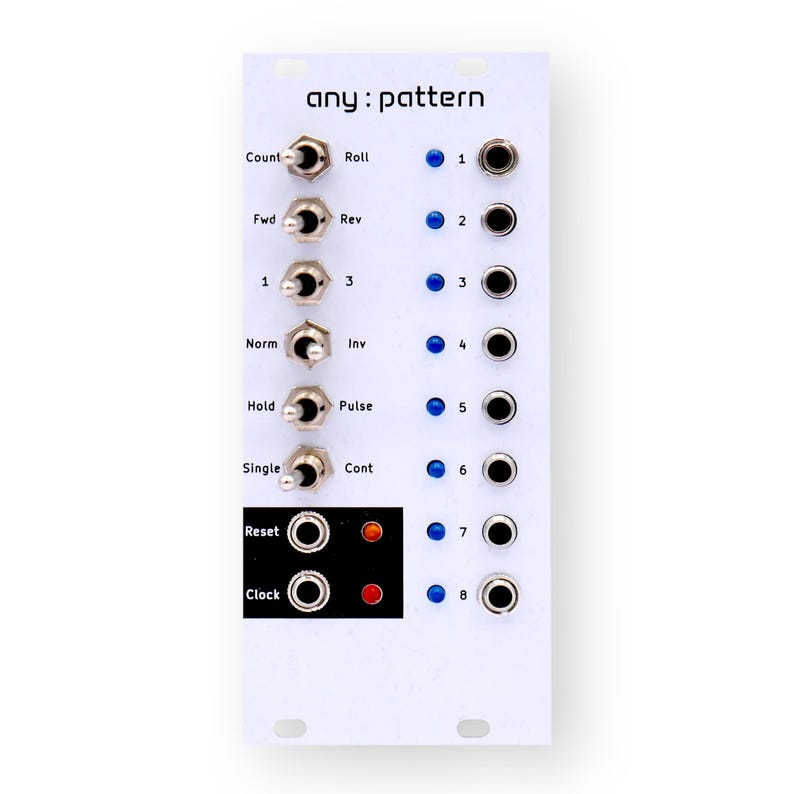 K&ouml;nnte beinhalten: Wei&szlig;es elektronisches Modul mit dem Text "any: pattern". Es verf&uuml;gt &uuml;ber Kippschalter, Tasten und Kontrollleuchten. Das Modul hat Beschriftungen wie "Count", "Roll", "Fwd", "Rev", "Norm", "Inv", "Hold", "Pulse", "Single" und "Cont".