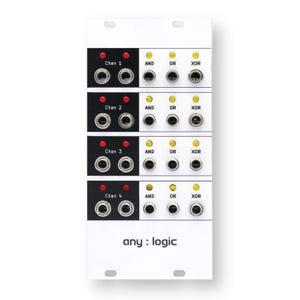 May include: A white electronic module with black and white sections. Each section has input jacks, indicator lights, and labels like "AND", "OR", and "XOR". The text "any: logic" is printed at the bottom. This is a piece of electronic equipment.