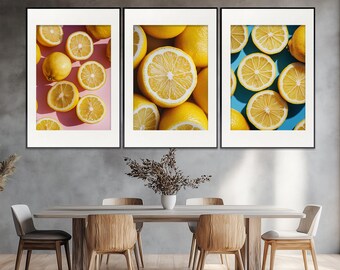 Puede incluir: Tres impresiones artísticas enmarcadas con imágenes de limones. Una impresión muestra limones enteros y en rodajas sobre un fondo rosa. Otra muestra limones sobre un fondo amarillo. La tercera muestra limones en rodajas sobre un fondo azul.