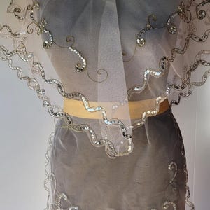 May include: A handmade wooden sign with the text "Welcome to our home" in a handwritten style. The sign is painted white with a distressed finish and a dark brown border. It is designed for indoor or outdoor use.