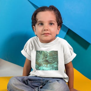 Child Wolf Winter Kids T-Shirt, Fantasy Animal Tee, Snowy Forest Wolf Rider Shirt, Magical Adventure Toddler Outfit, Enchanted Wildlife Gift