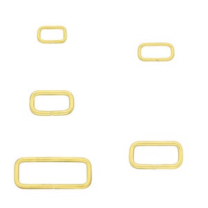 May include: Several gold-coloured rectangular rings of varying sizes. The rings are open on one side, likely designed as clasps or connectors. The image is set against a plain white background.