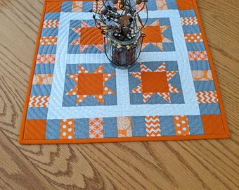 Quilted table runner, Square table topper, Orange and gray stars, Handmade in USA