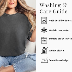 May include: A dark gray, short-sleeved t-shirt with a crew neck. The image includes a "Washing & Care Guide" with instructions: wash with like colors, wash in cool water, tumble dry at low-temp, do not bleach, and do not iron design.