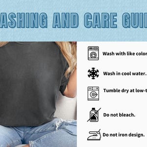 May include: A dark gray t-shirt with the text "WASHING AND CARE GUIDE" in blue. The guide includes instructions to wash with like colors, in cool water, and tumble dry at low-temp. It also advises against bleaching and ironing the design.