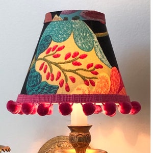 Whimsy sconce or chandelier shade, clip on, colorful fabric trimmed with a Pom Pom fringe