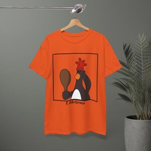 Feathers Tshirt | Wrong Trousers | Criminal Mastermind | British Animation Orange