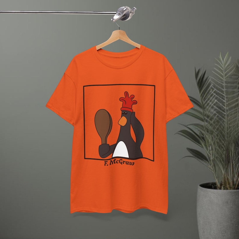 Feathers Tshirt | Wrong Trousers | Criminal Mastermind | British Animation Orange