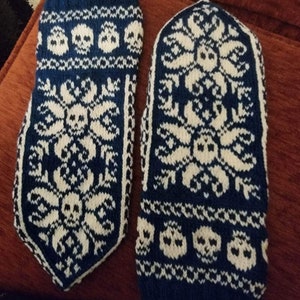 Hand knit skull themed mitts