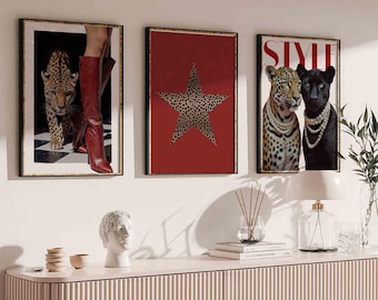 May include: Three framed art prints. One features a leopard and red boots, another a leopard print star on a red background, and the third shows two leopards with pearl necklaces, with the word "STYLE" at the top.