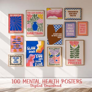 May include: A collection of framed posters with motivational quotes and floral designs. The posters feature various colors, including blue, pink, yellow, and brown. The text "100 MENTAL HEALTH POSTERS Digital Download" is at the bottom.