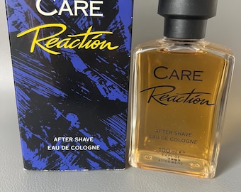 May include: A bottle of Care Reaction aftershave with a black cap and a clear glass body. The bottle is next to a blue box with the words "CARE Reaction" in yellow script. The box also says "AFTER SHAVE EAU DE COLOGNE". The bottle contains 3.4 fl oz.