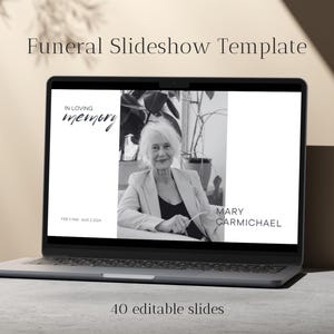May include: A laptop screen displaying a funeral slideshow template with a black and white photo of a woman. The text on the screen reads "In loving memory" and "Mary Carmichael". The template includes 40 editable slides.