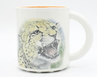 Fleeting Elegance: Cheetah Portrait Ceramic Mug | handmade ceramic art mug | featuring wild big cat | unique gift idea for animal lovers