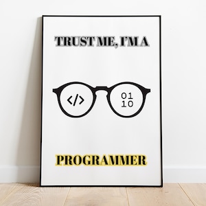 May include: A white poster with black text that reads "TRUST ME, I'M A PROGRAMMER".  The poster features a pair of black glasses with the left lens showing the code symbol "< >" and the right lens showing the numbers "01 10".