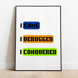 May include: A white framed poster with three colorful rectangular labels. The labels read "I came", "I debugged", and "I conquered".