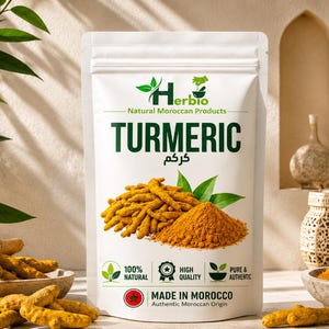 May include: A white stand-up pouch of Herbio brand turmeric with a green logo, text reading TURMERIC, and an image of raw turmeric roots and yellow powder. The label includes text stating 100% natural, high quality, pure and authentic, and made in Morocco.