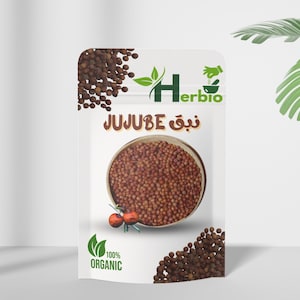 Puede incluir: Una bolsa blanca con el texto "JUJUBE" y la marca "Herbio" en verde. La bolsa contiene pequeños frutos de azufaifo redondos y marrones. Las palabras "100% ORGANIC" también están impresas en la bolsa.