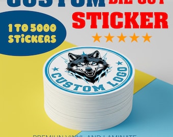 May include: A stack of white, die-cut stickers with a custom logo featuring a wolf's head. The stickers are round with a blue border and text. The image includes the text "CUSTOM DIE CUT STICKER" and "1 TO 5000 STICKERS".