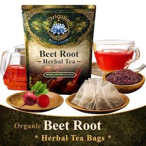 May include: A pouch of Origins Blue Lotus Beet Root Herbal Tea with a graphic of beet roots. Beside it sits a glass teapot and a cup filled with red tea, a wooden bowl of dried beet root pieces, and a wooden plate with a fresh beet root and tea bags.