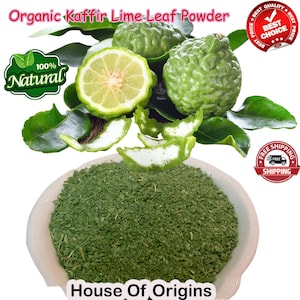 May include: A white bowl filled with green kaffir lime leaf powder. Fresh kaffir lime leaves and fruit are shown above the bowl. The text "Organic Kaffir Lime Leaf Powder" and "100% Natural" are visible in the image.