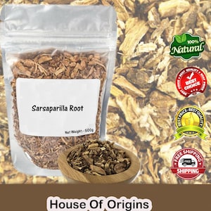 May include: A clear plastic bag filled with Sarsaparilla Root, with a net weight of 500g. A wooden bowl contains a sample of the root. The background features more of the root. The image includes labels with text such as "100% Natural" and "Best Choice".