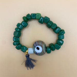 Beaded tassel bracelet; evil eye; glass beads; unique bracelet