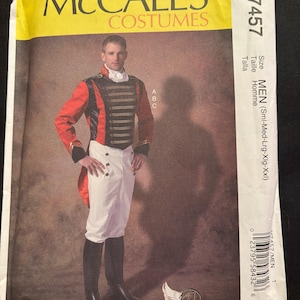 May include: A sewing pattern for a men's costume. The pattern is for a red and black jacket with gold trim and white pants. The pattern is from McCall's Costumes and the pattern number is M7457.