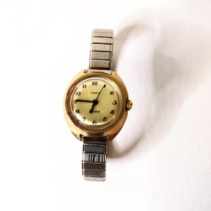 Vintage 1970s ladies Timex, electric gold tone wristwatch, good condition, works