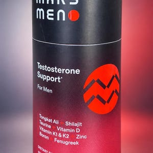 May include: A cylindrical black and red container of Mars Men Testosterone Support dietary supplement. The label features the brand name, a red circular logo, and a list of ingredients including Tongkat Ali, Shilajit, Taurine, Vitamin D, K1, K2, Zinc, Boron, and Fenugreek, with 150 capsules for a 30-day supply.