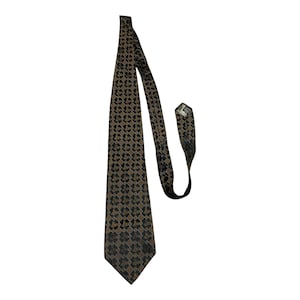 May include: A brown and black patterned necktie. The tie features a repeating geometric design in shades of brown and black. The tie is made of a smooth fabric and is suitable for formal or business attire.