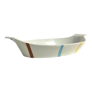 May include: White ceramic serving dish with a boat-like shape and two handles. The dish is decorated with vertical stripes in brown, blue, and yellow. The dish is empty and sits against a white background.